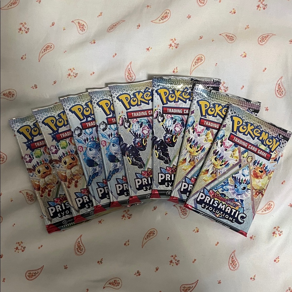 Pokémon Prismatic Evolutions Booster Packs - Assorted Eeveelutions